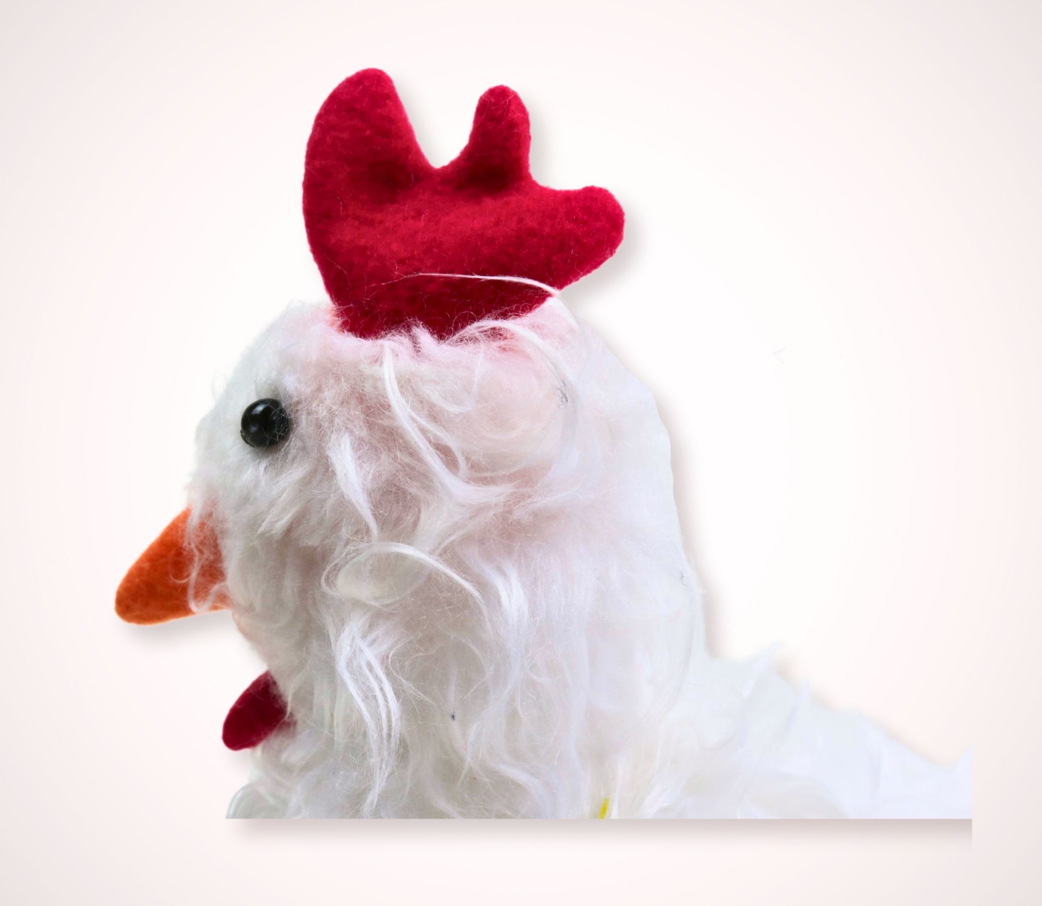 Plüschtier Henne Ansicht Kopf Kamm Schnabel Kehllappen